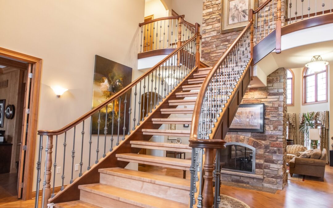 interior staircase with wood steps and modern railing in residential home