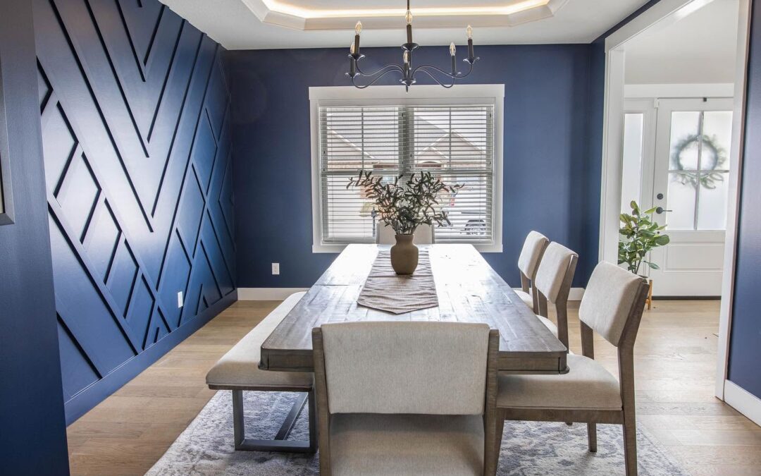 Natural light entering a beautifully painted living room with neutral walls and hardwood flooring.