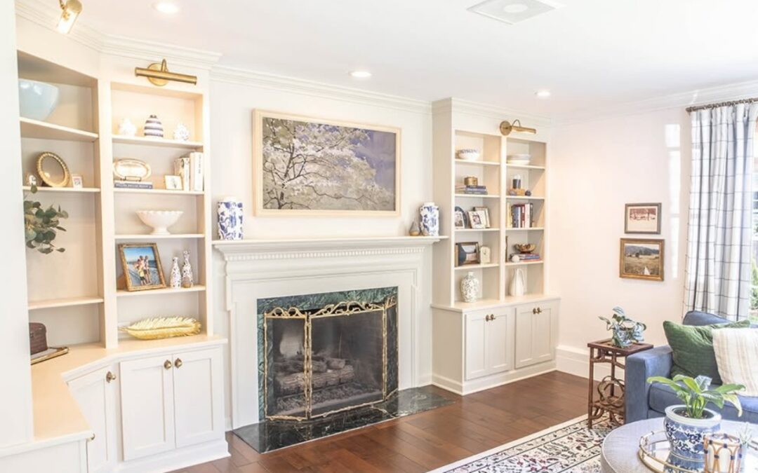 Built-in shelving and fireplace surround with custom finishes by Shawluxe
